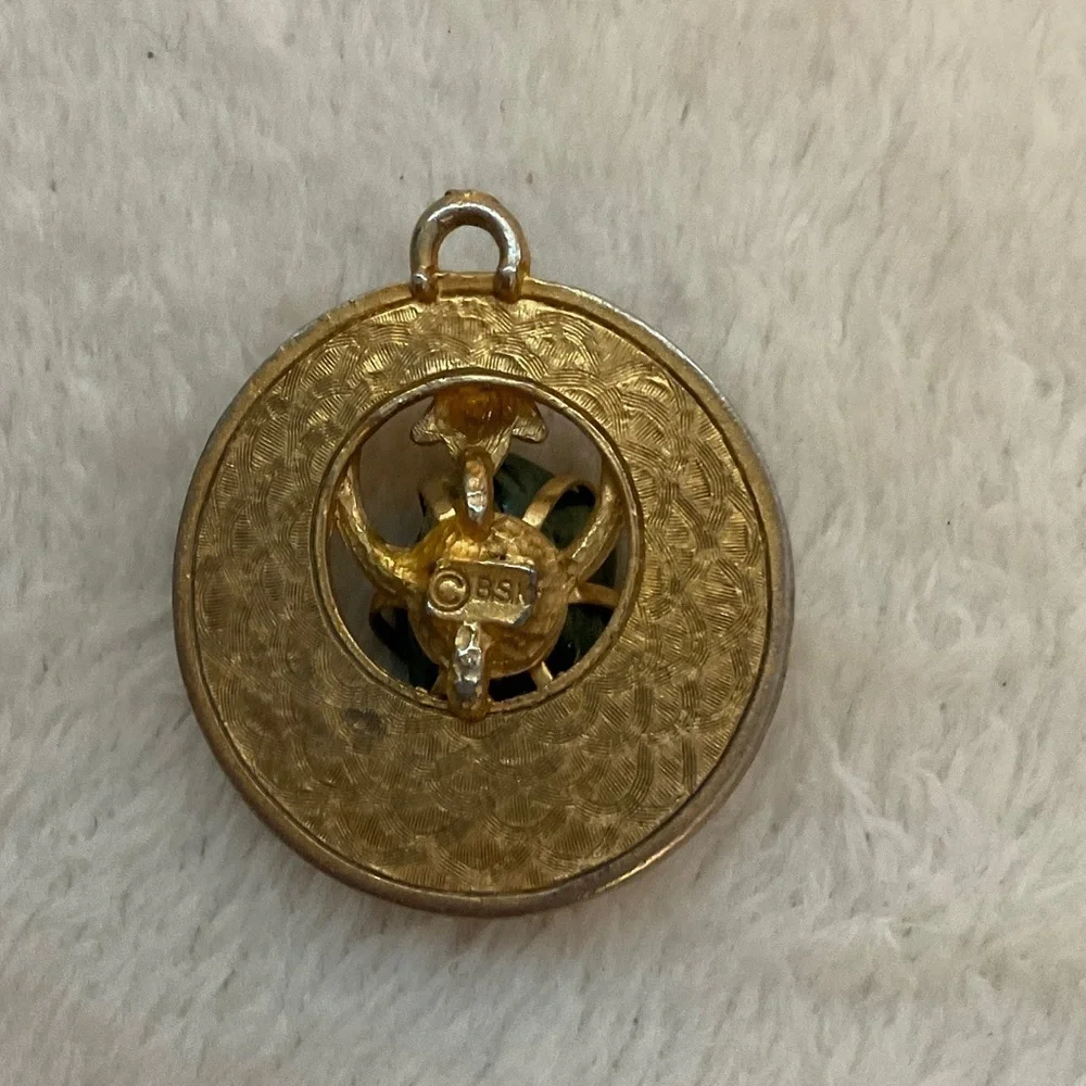 Elegant Gold and Green Brooch